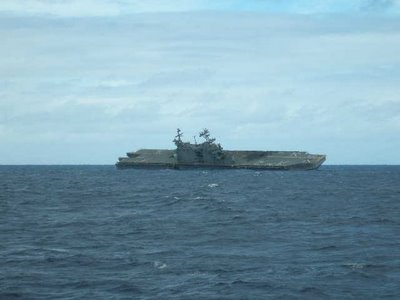 USS Belleau Wood begins to list