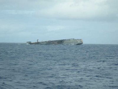 USS Belleau Wood begins to sink